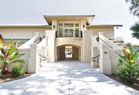 Stucco building with arched entryway